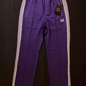 Purple track pants